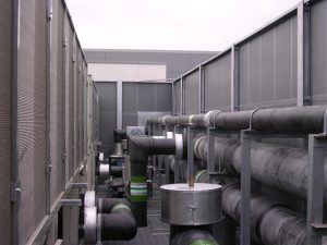 Structural acoustic screen for industrial noise control, reducing sound transmission and enhancing workplace sound insulation.